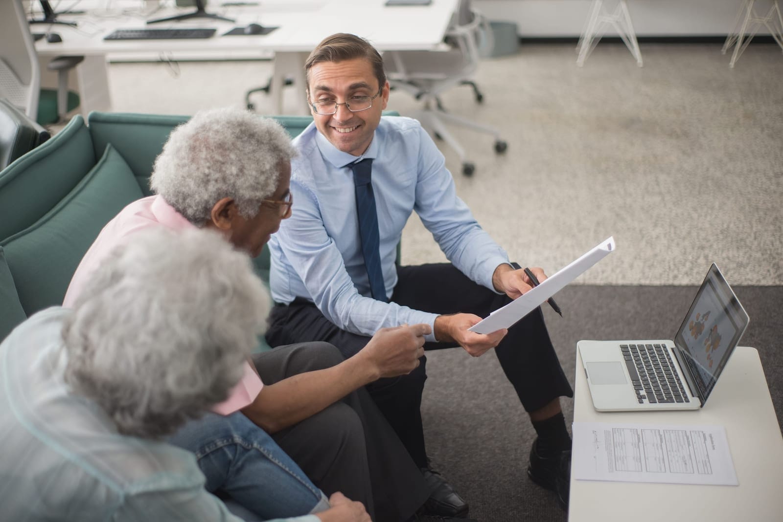 A business adviser reviewing figures with a client
