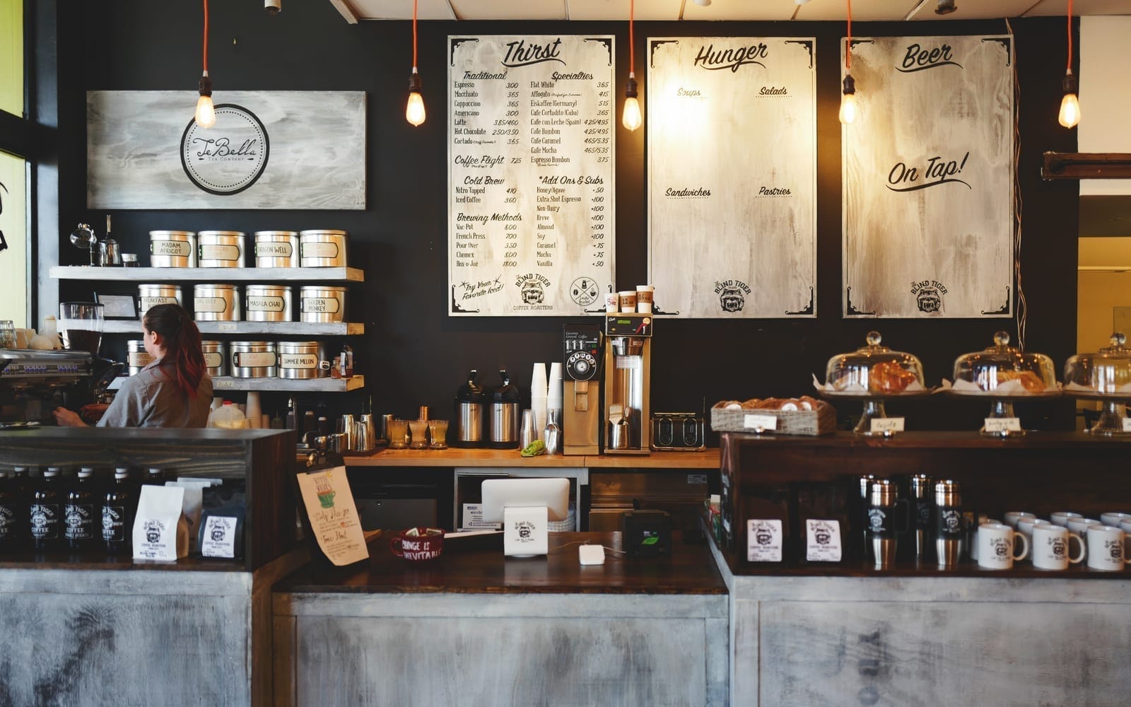 The counter and menu boards of a café hospitality business