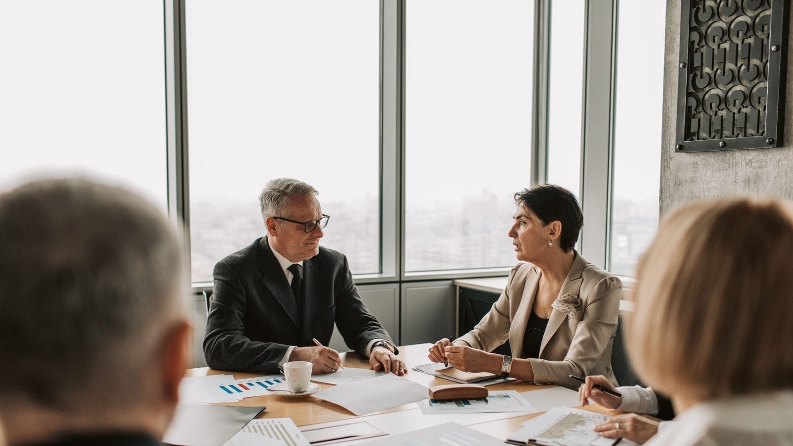 A limited company director in a professional meeting with an accountant
