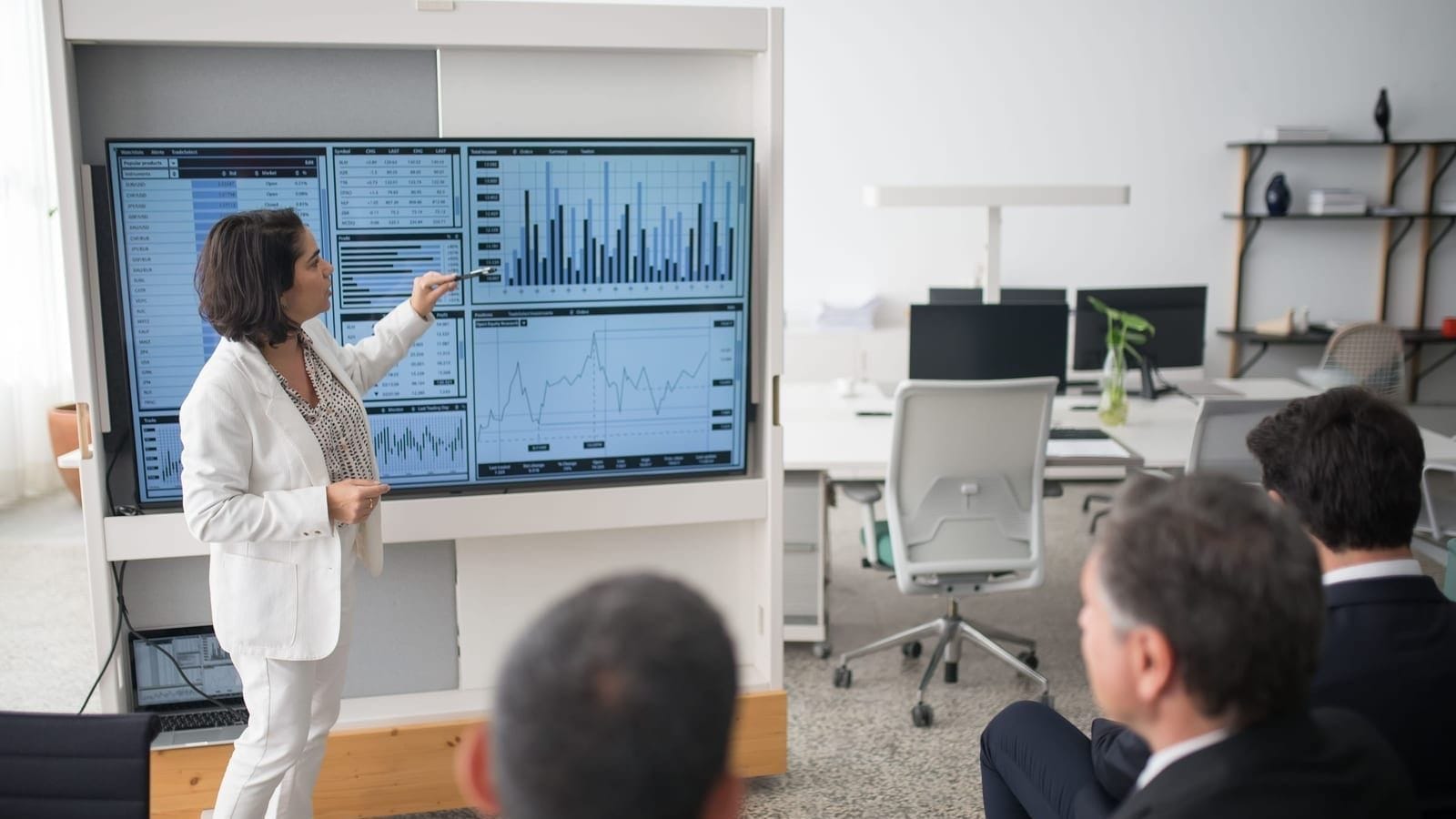 A small business owner reviewing figures while preparing a self assessment tax return